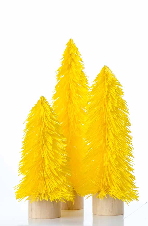 Trio of bright yellow christmas trees