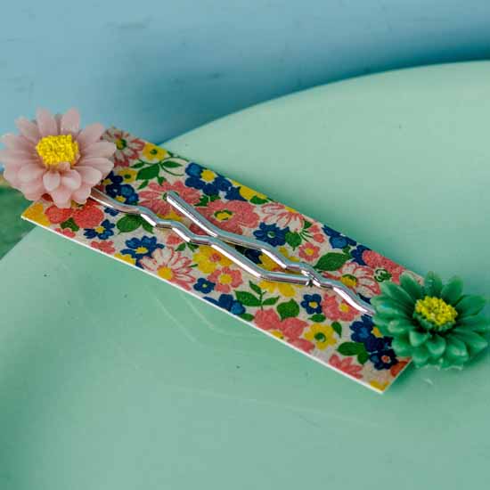 Hazy daisy hair slides - coral and sea green