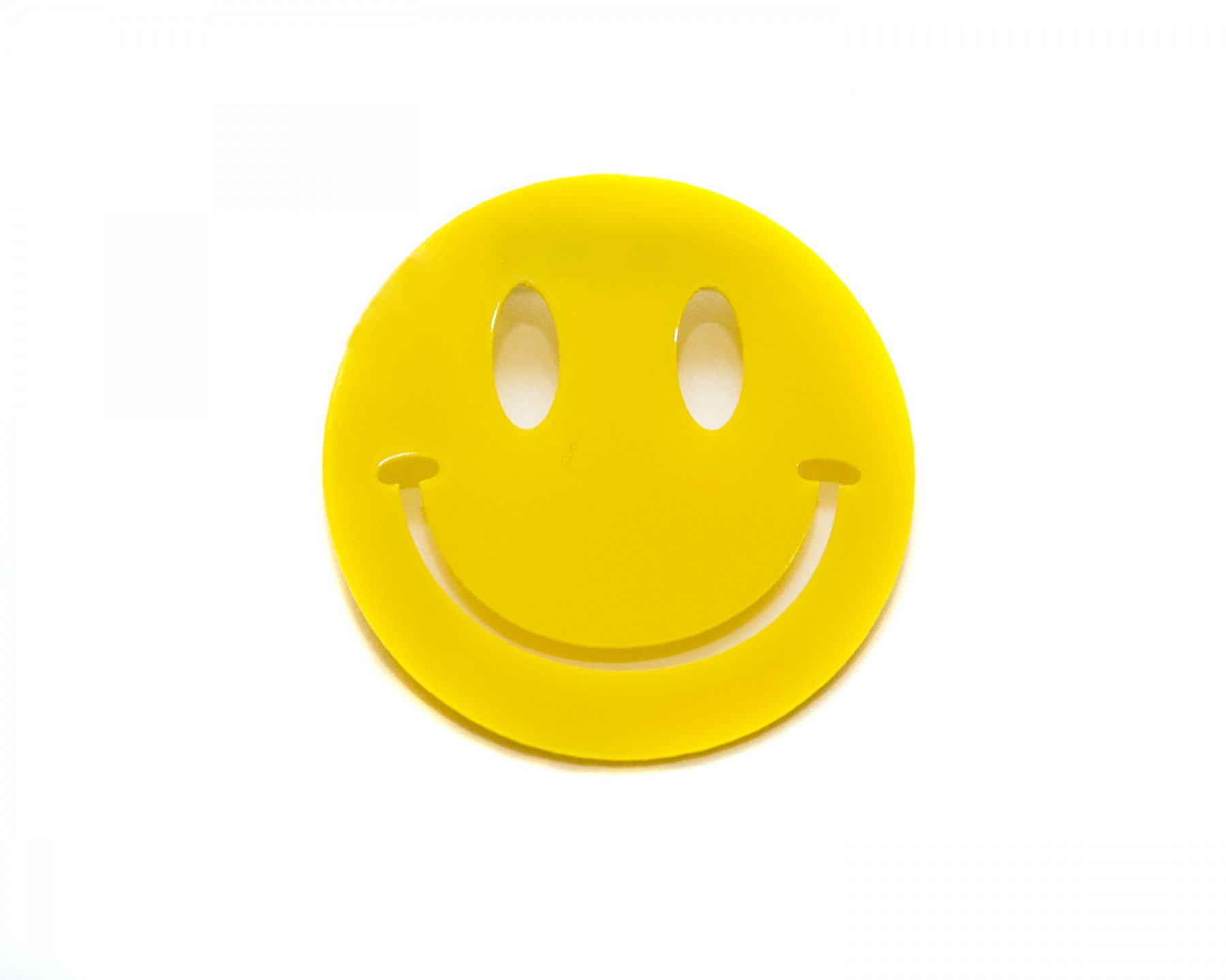 Smiley face brooch