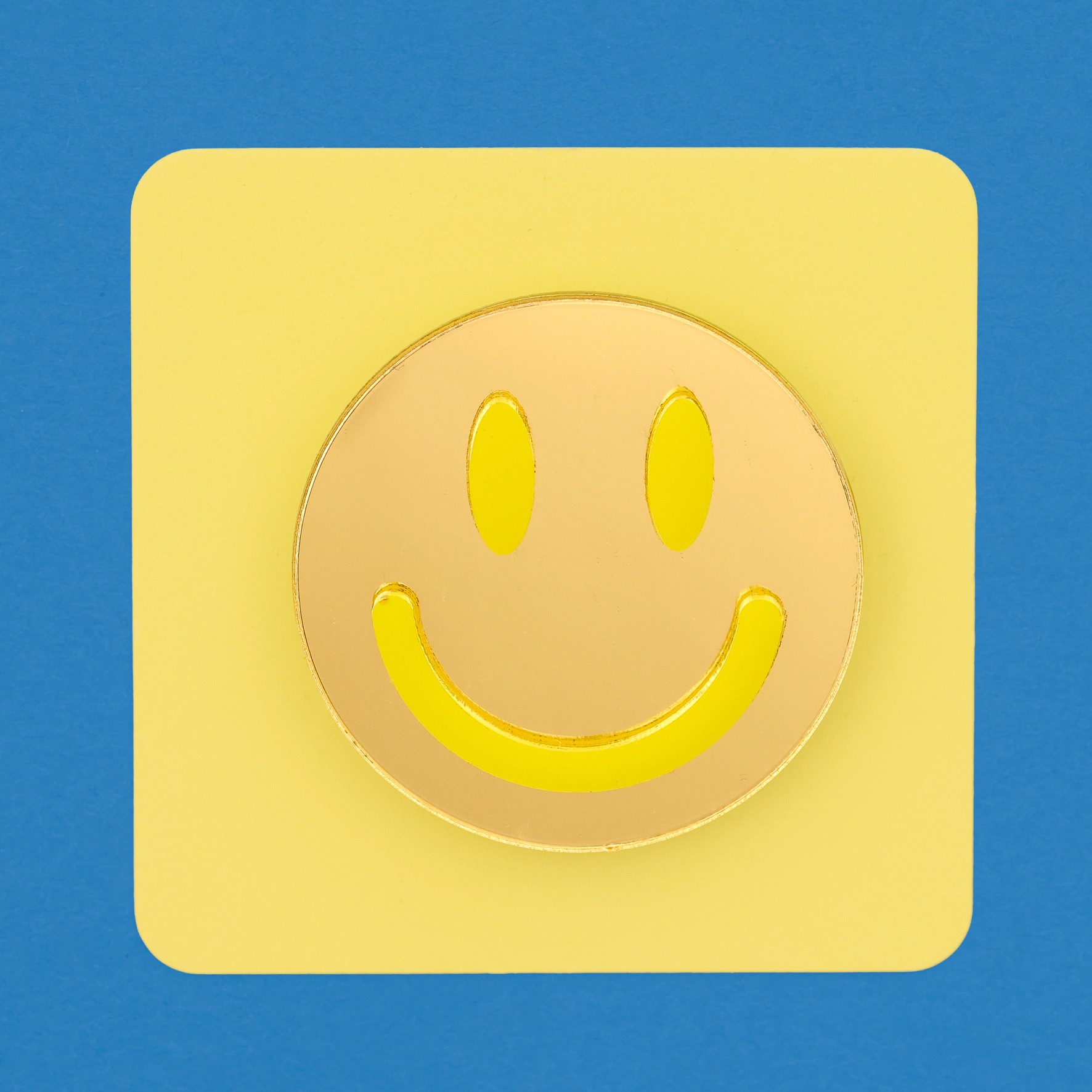 smiley face brooch
