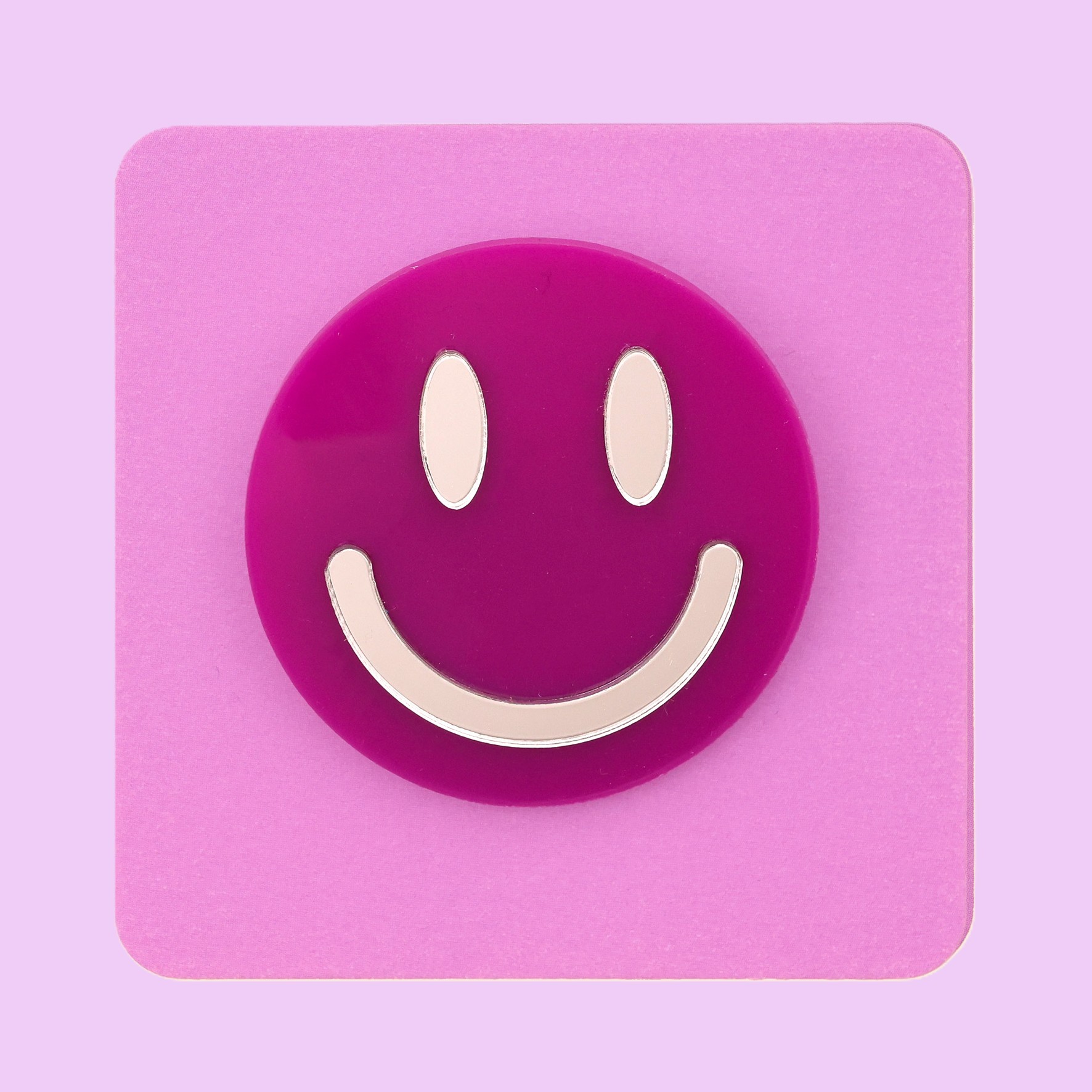 Smiley face brooch