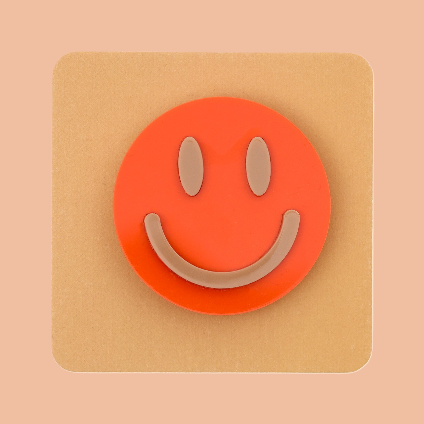 smiley face brooch