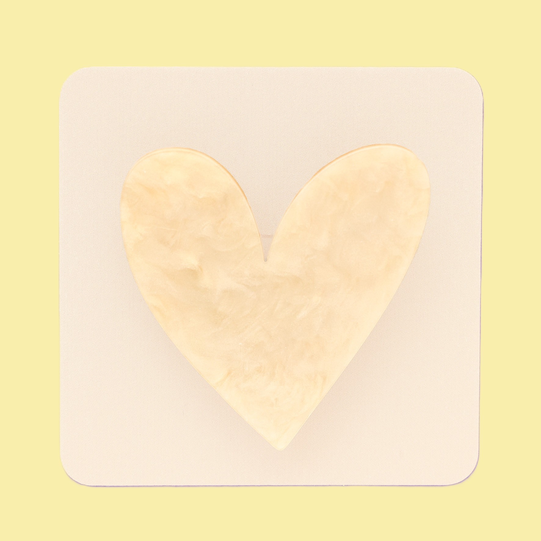 meg heart brooch