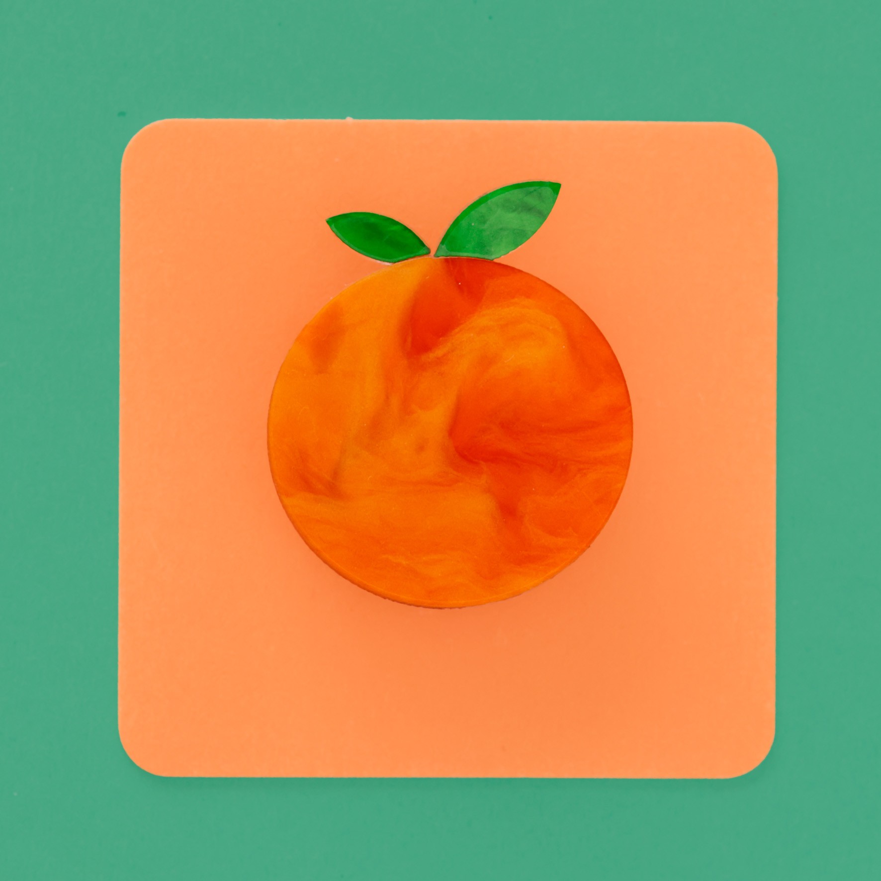 Orange brooch