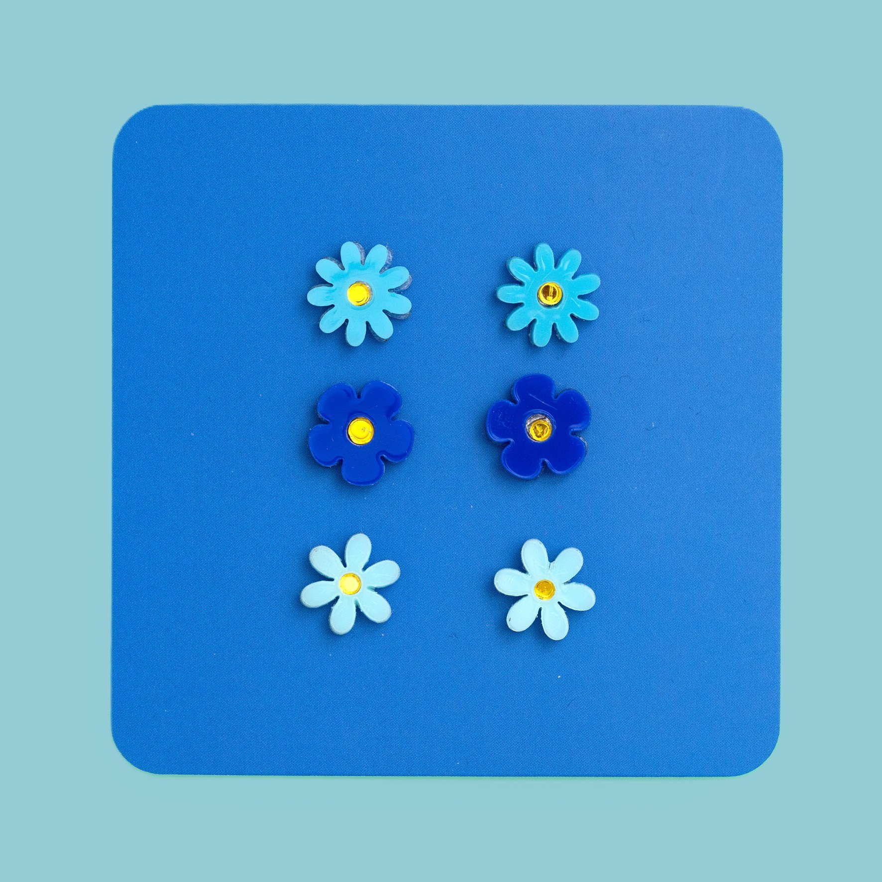 Trio of jean flower earrings