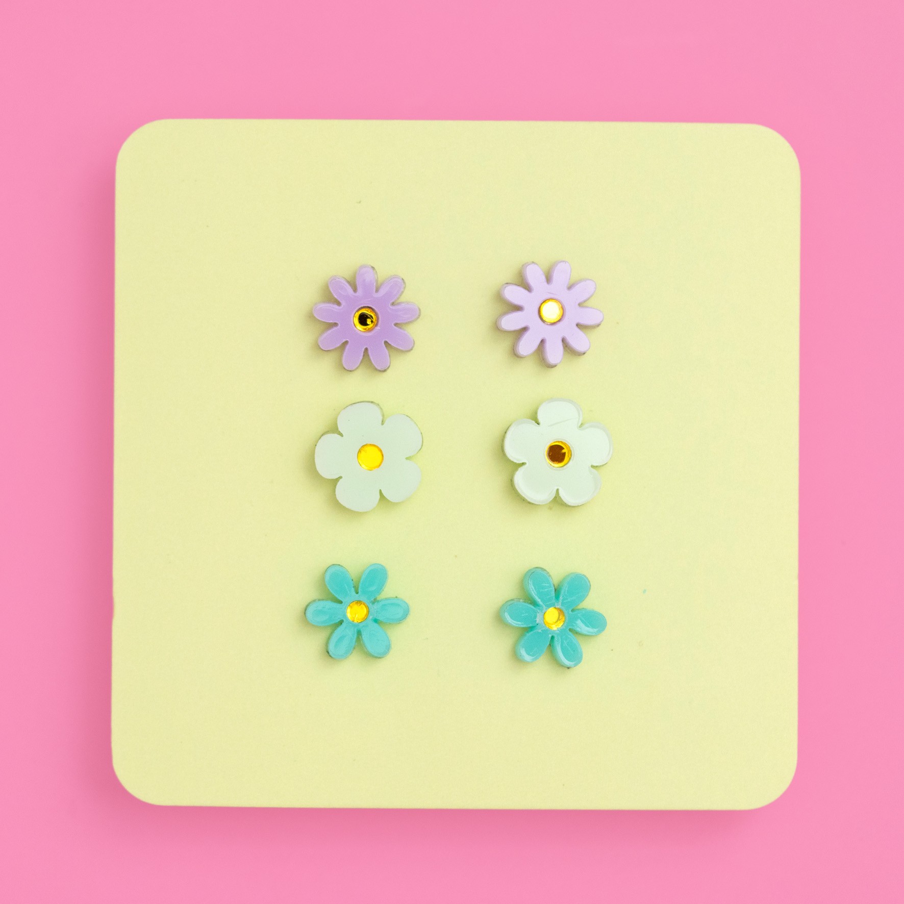 Trio of jean flower earrings