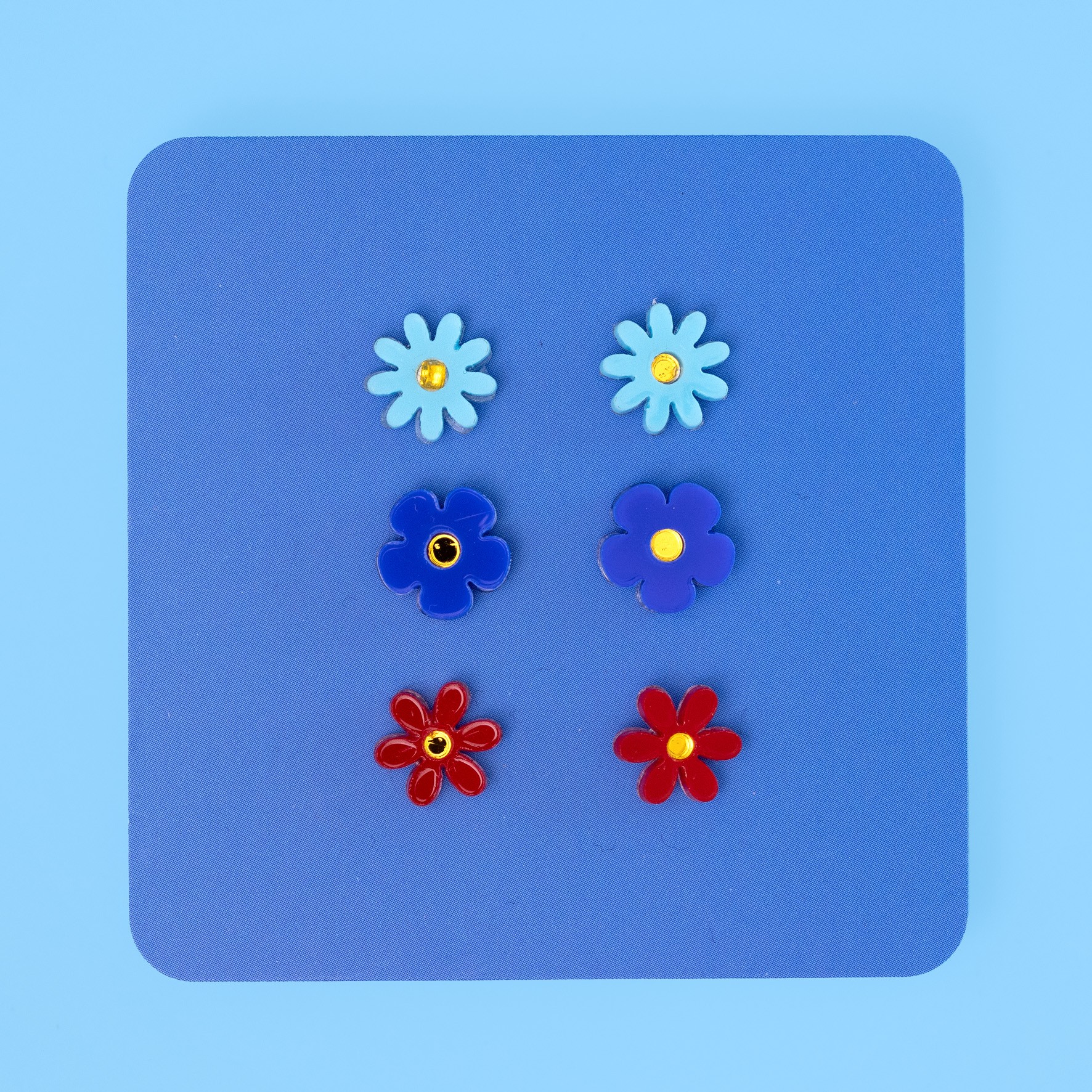 trio of jean flower earrings