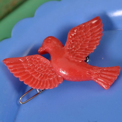 Heidi bird hair clip - red
