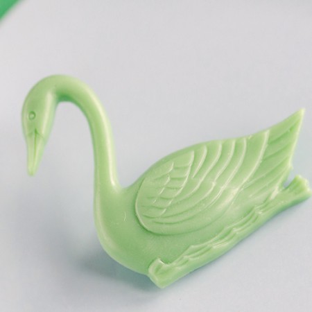 maris swan brooch - bakelite green