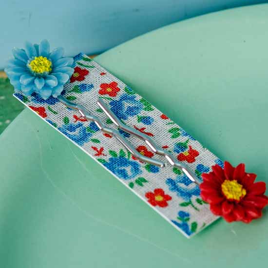 hazy daisy hair slides - blue and red